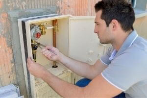 Man Working on Valves